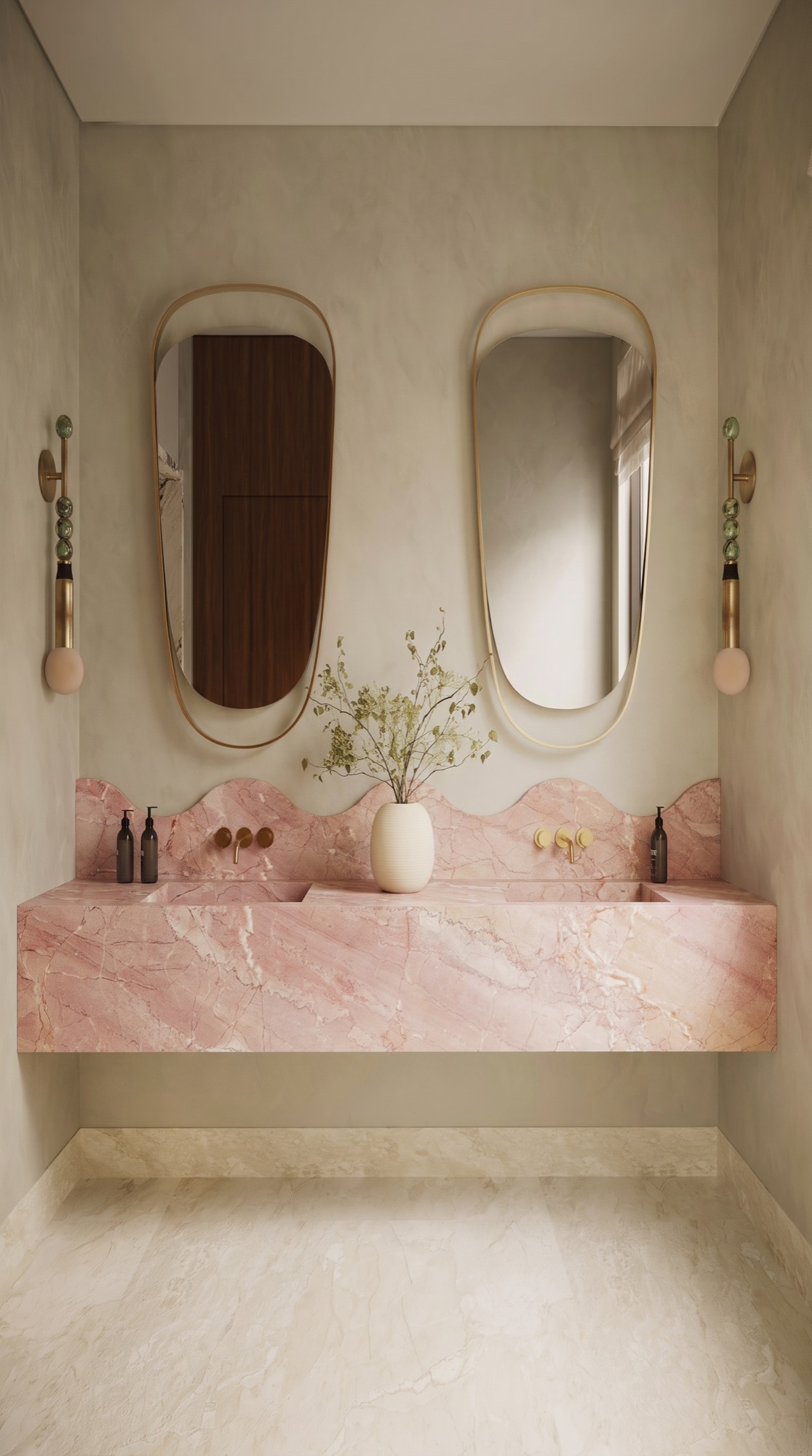 Cream Pink double vanity with two integrated basins and a curved stone backsplash