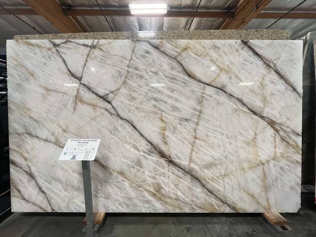 Full Cristallo quartzite slab with bold grey and taupe internal movement